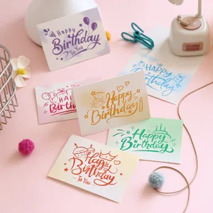 Assortment of colorful Happy Birthday cards with artistic fonts and cute icons