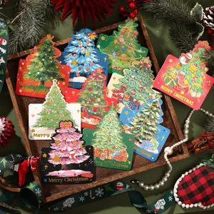 Detailed view of colorful Christmas tree-shaped greeting cards in a wooden tray.