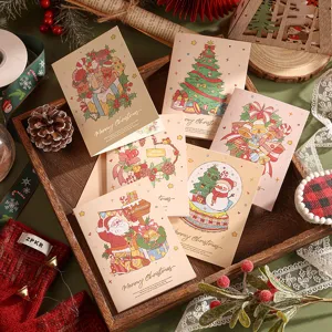 Détail de cartes de vœux de Noël à l'aquarelle avec dorure dans un décor festif