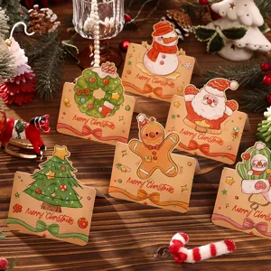 Detail view of assorted vintage cartoon Christmas greeting cards on a festive wooden table