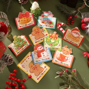 Detailed view of various cute cartoon Christmas cards with festive characters