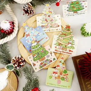 Detailed view of assorted Christmas cartoon greeting cards with festive decorations