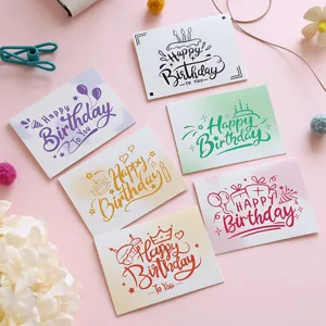 Detailed view of six colorful birthday greeting cards with hand-drawn 'Happy Birthday' text.