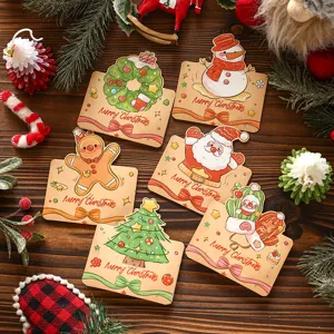 Detailed view of various retro cartoon Christmas cards featuring Santa and snowman