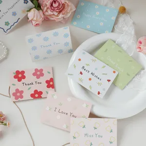 Assorted mini floral greeting cards with gold and pastel patterns and warm wishes