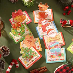Detail view of various cute cartoon Christmas gift tags with festive holiday decorations.