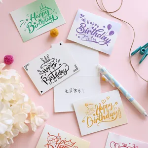 Detailed view of artistic Happy Birthday greeting cards featuring colorful hand-drawn lettering