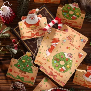 Close-up detail of vintage cartoon Christmas card headers with Santa and tree motifs