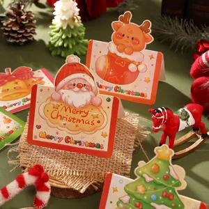 Detailed view of 3D cartoon Christmas greeting cards with festive Santa and reindeer