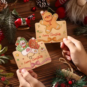 Close-up detail of retro cartoon Christmas gift tags with cute gingerbread man design.