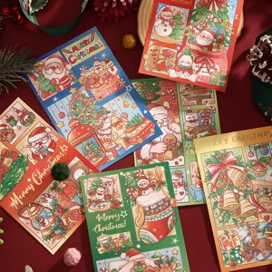Detailed macro view of festive gold-stamped Christmas cards with cute holiday illustrations.