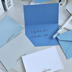 Biglietti d'auguri minimalisti tinta unita con stampa oro Thank You e buste coordinate