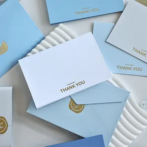 Eleganti biglietti di ringraziamento minimalisti bianchi e blu con scritte in oro e buste