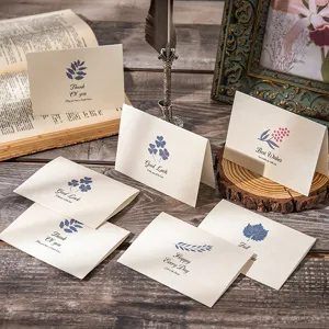 Vintage greeting card set featuring botanical illustrations and elegant text details.