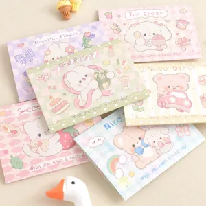 Primer plano de lindas tarjetas de felicitación de dibujos animados en tonos pastel.