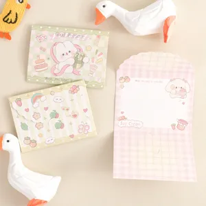 Detalle de tarjetas de felicitación plegables de dibujos animados con patrones en pastel