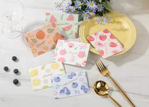 Detailed view of cute fruit themed greeting cards featuring elegant gold foil lettering