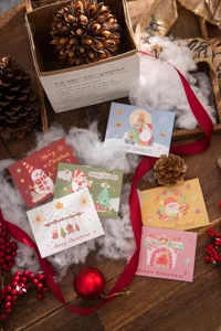 Collection of colorful Christmas tri-fold greeting cards with festive holiday designs