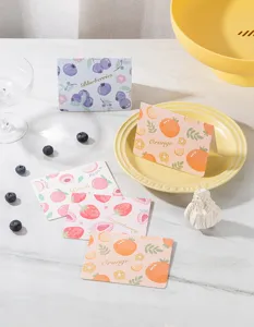 Close-up of cute fruit-themed gift cards with gold-stamped lettering