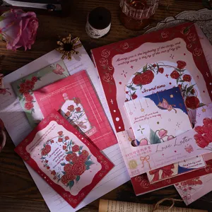 Detailed view of vintage oil painting style floral letter paper and matching envelopes