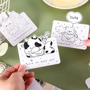 Primer plano de tarjetas de felicitación de vaca y oso de dibujos animados para niños