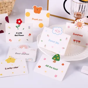 Variedad de lindas mini tarjetas de felicitación con mensajes en inglés y dibujos alegres