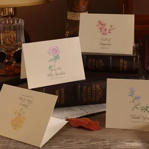 Vintage fold-over greeting cards with elegant floral illustrations and blessings