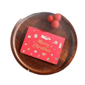 Festive red Christmas greeting card featuring gold bronzing text and gift illustrations.