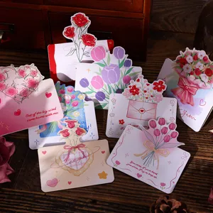 Vista detallada de varias tarjetas de felicitación florales con coloridos ramos en 3D