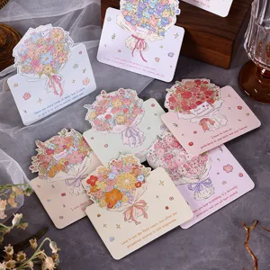 Detailweergave van diverse handgeschilderde pop-up boeket wenskaarten met citaten