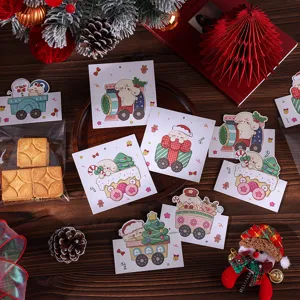 Étiquettes de cadeau de Noël chiot dessin animé utilisées comme en-têtes de sac
