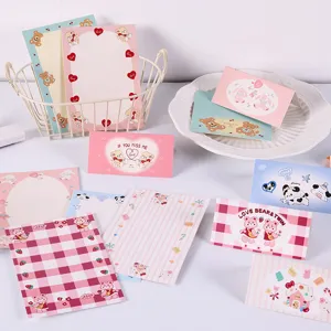 Detailed view of assorted cute animal-themed paper backing cards for gift packaging decorations