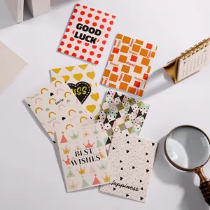 Sammlung minimalistischer Grußkarten mit bunten Mustern und englischen Segenssprüchen