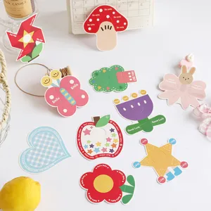 Close-up of colorful cartoon forest themed lollipop decorative cards with English greetings
