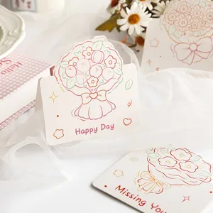 Close-up of cute crayon style flower bouquet folding greeting cards with Happy Day text