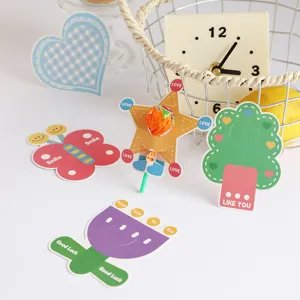 Detailed view showing colorful cartoon lollipop card decorations with sweet messages