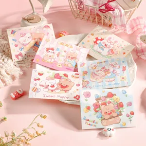 Detail view of various cute cartoon greeting cards with bears and bunnies designs