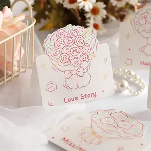 Close-up of a Love Story greeting card with a colorful crayon flower bouquet illustration.
