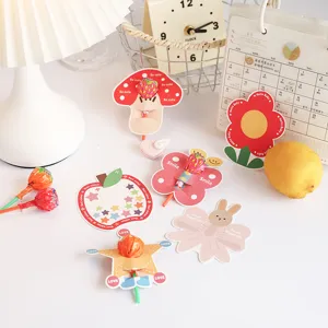 Detail shot of colorful cartoon forest themed lollipop decorative cards for kids