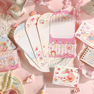Detail view of cute cartoon tri-fold greeting cards with kawaii puppy and bear designs