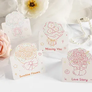 Detailed macro view of assorted crayon-style flower bouquet folded greeting cards