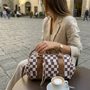 Stylish brown and white checkered large capacity travel duffel bag for weekend trips