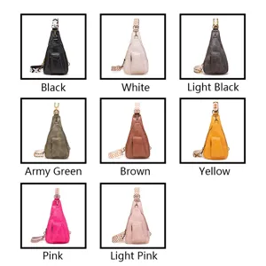 Opciones multicolor de bolsos de pecho retro de PU con correas bordadas anchas.