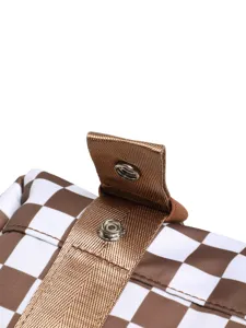 Macro detail shot of brown checkered travel bag showing secure metal snap button closure.