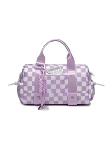 Macro view of purple checkered travel bag showing front pocket utility for storage