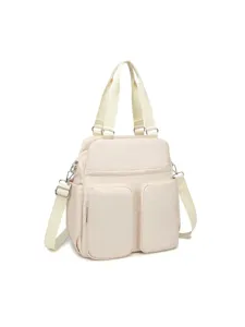 Vista lateral del bolso de viaje y gimnasio impermeable beige multibolsillos para mujer