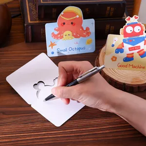 Detailed view of handwriting on a cute cartoon greeting card with unique cutout design