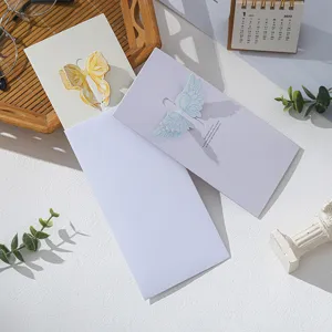 Detailed view of 3D hollow gift card with butterfly bow and angel wings designs