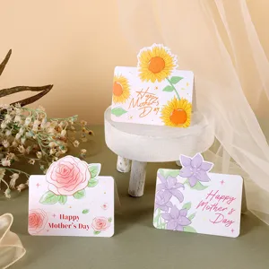 Detailed view of three floral Mother's Day greeting cards with Happy Mother's Day text