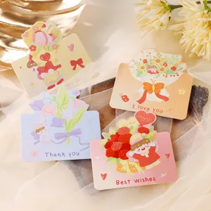 Detalle de cuatro tarjetas florales con mensajes de agradecimiento y buenos deseos